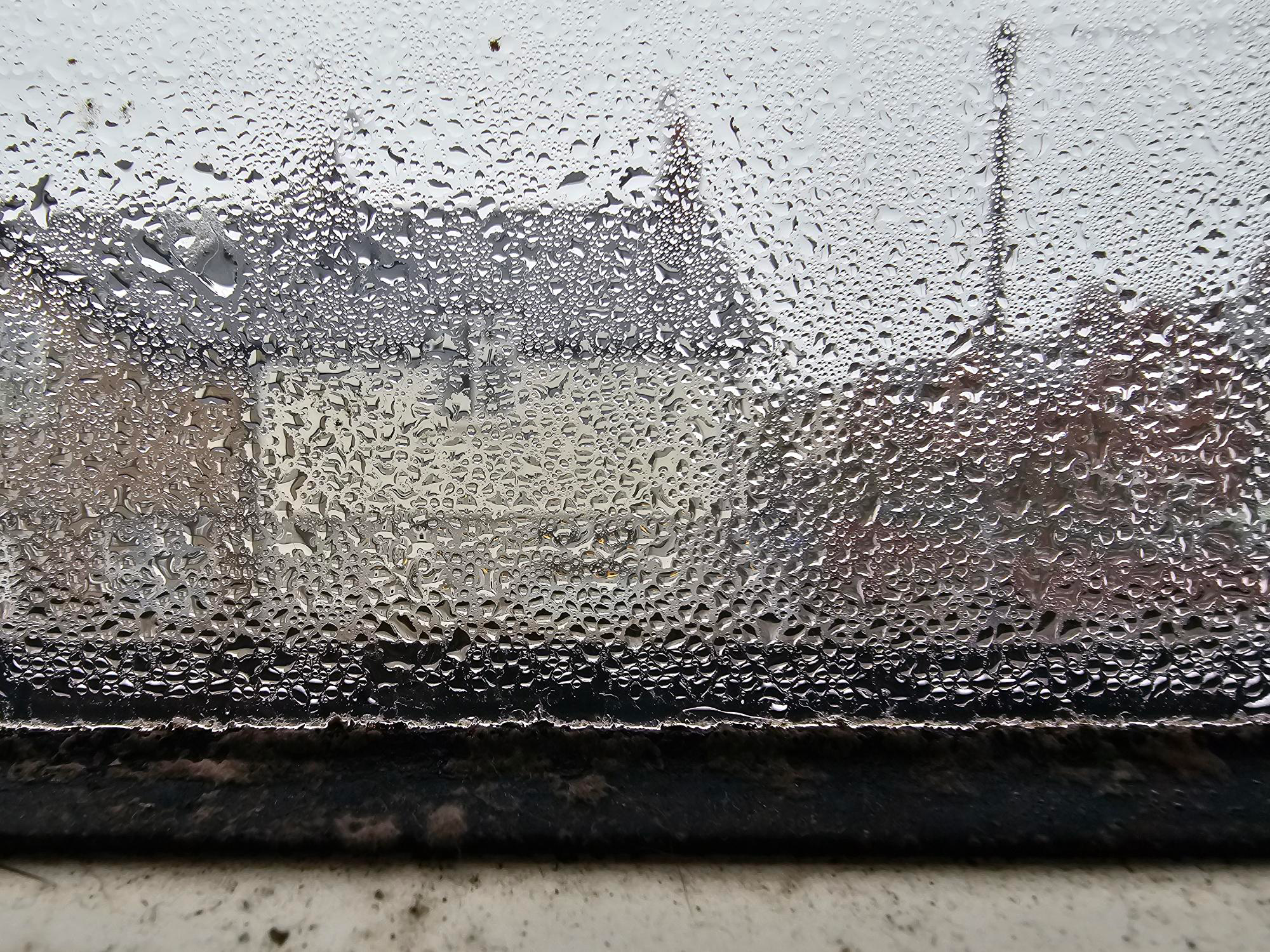condensation-on-window-overlooking-house