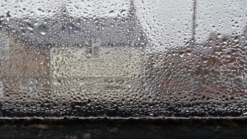 condensation-on-window-overlooking-house