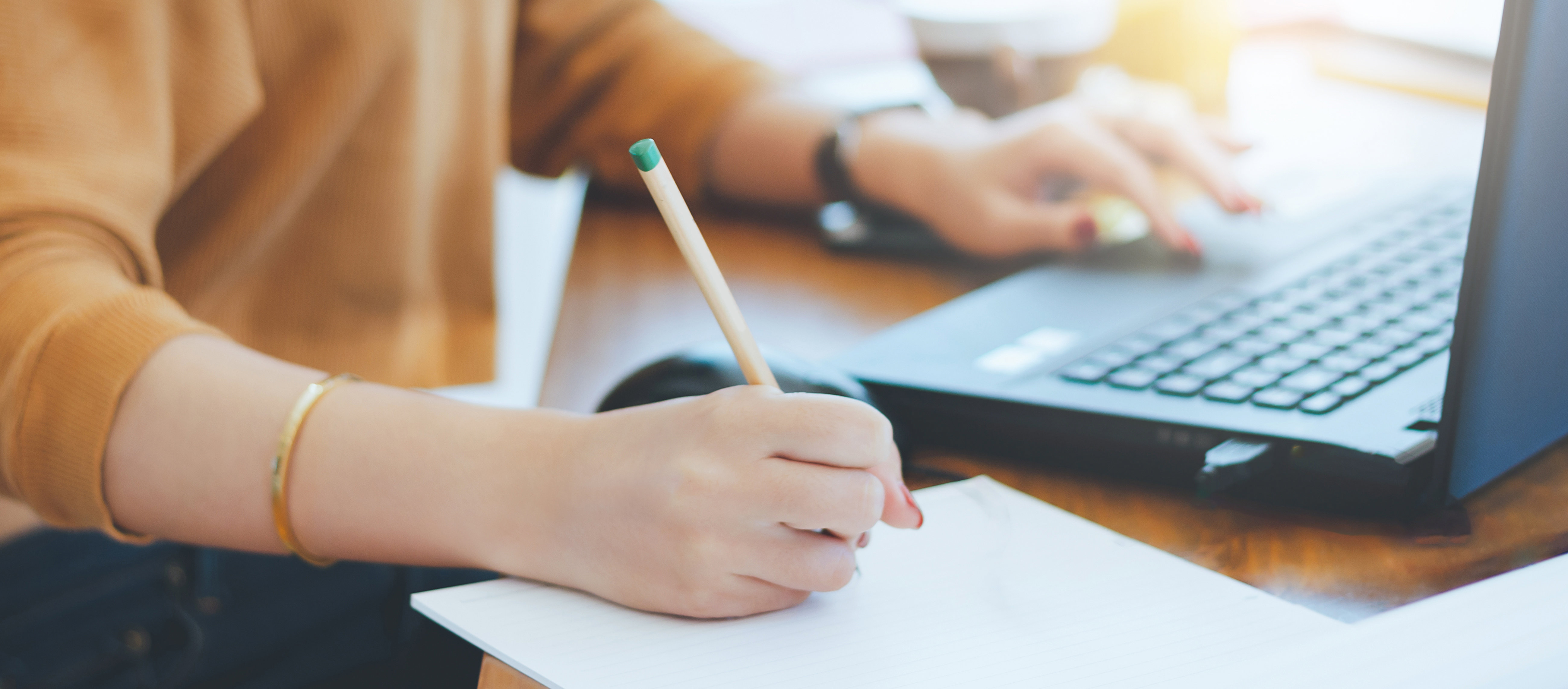 person-writing-down-notes