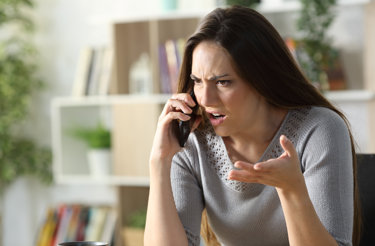 woman-complaining-on-telephone