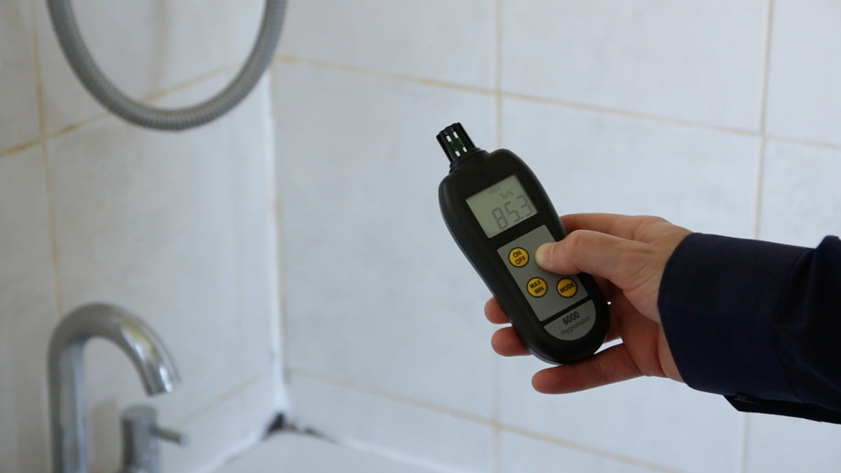 man-reviewing-humidity-levels