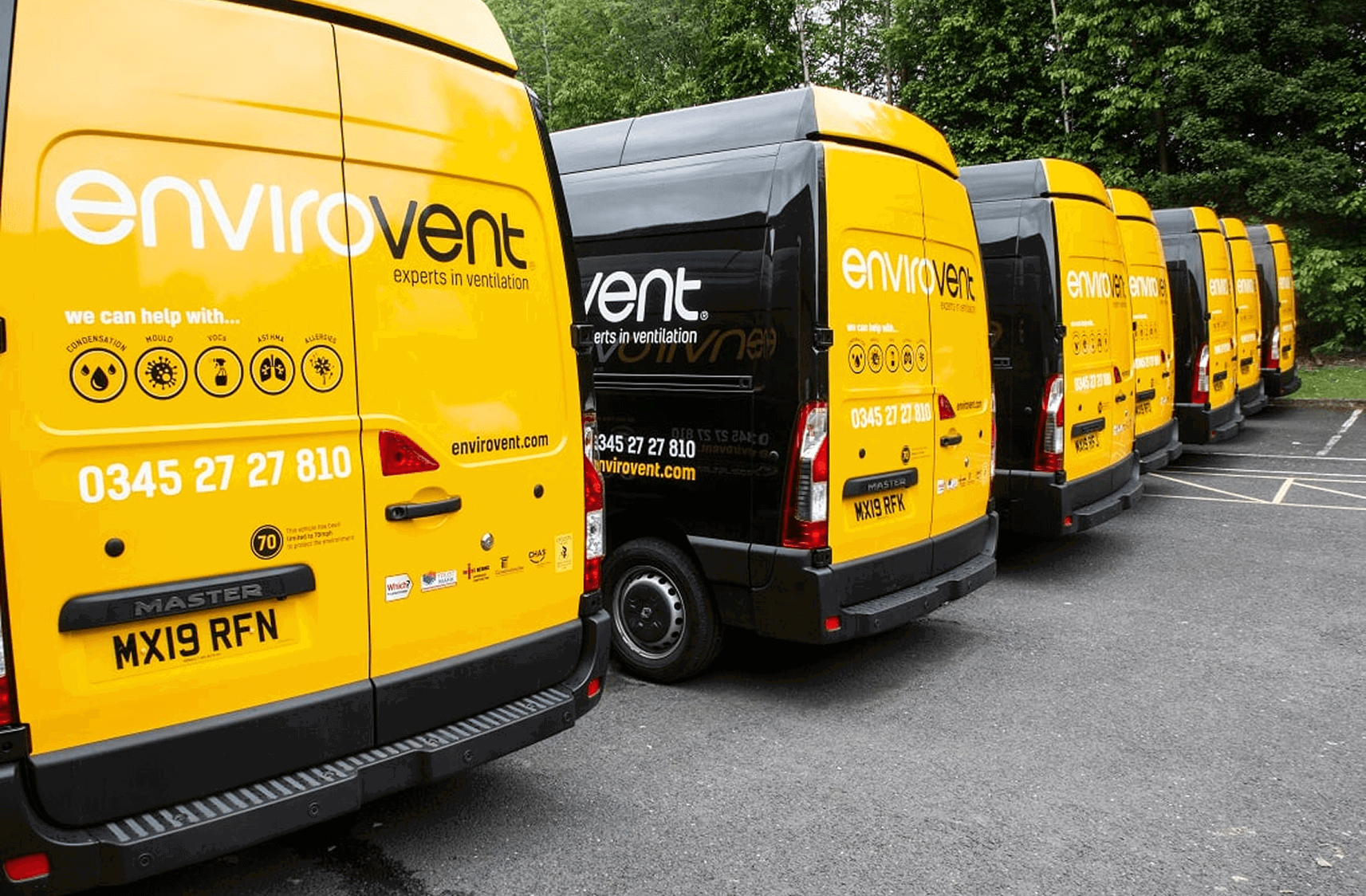 A row of company vans parked