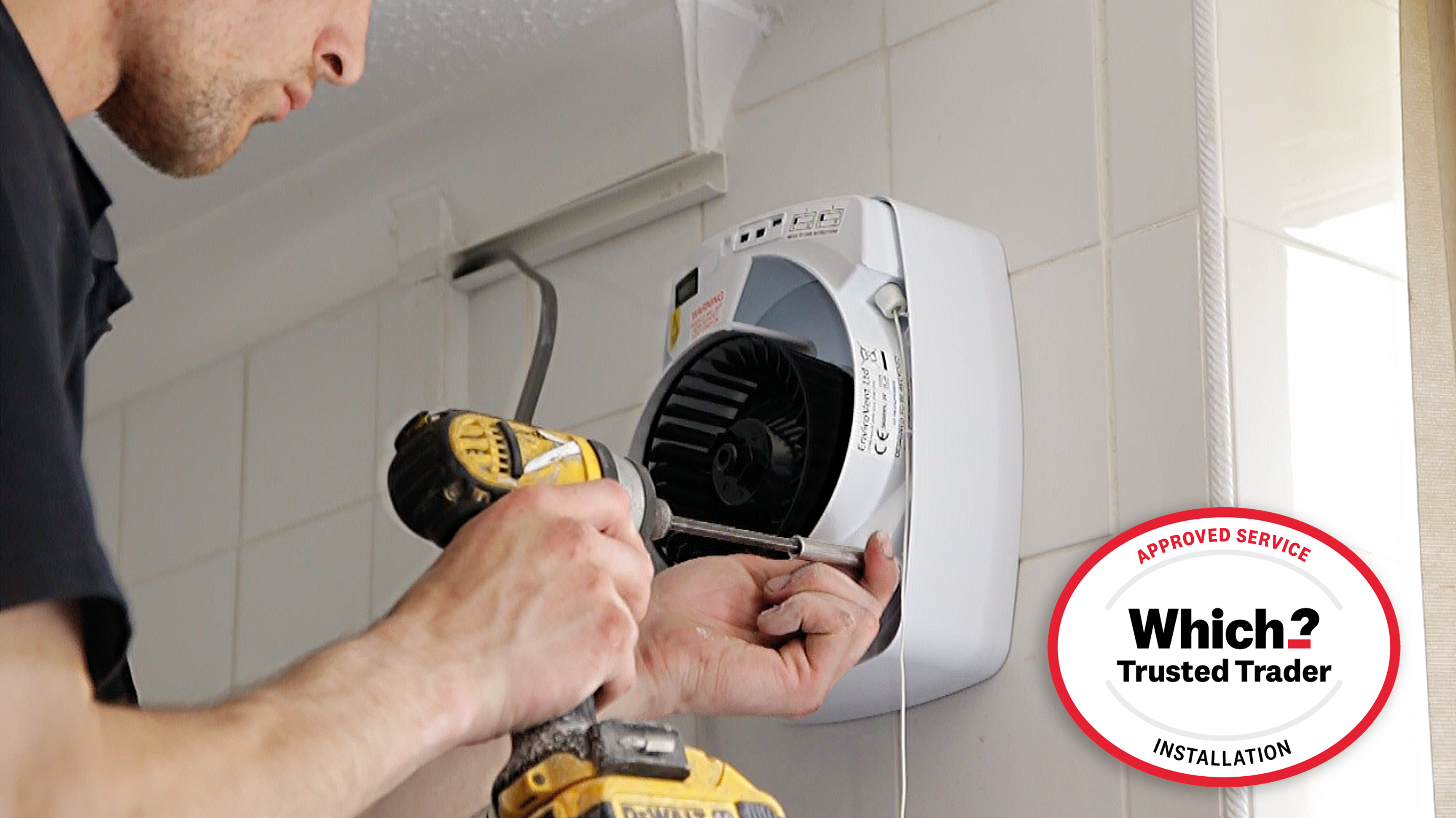 man-installing-bathroom-extractor-fan
