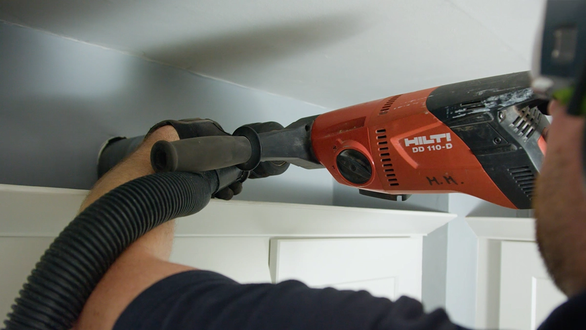 man-drilling-hole-in-wall